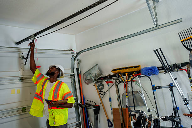 Professional Garage Door Panel Replacement technician working in Springville, IA